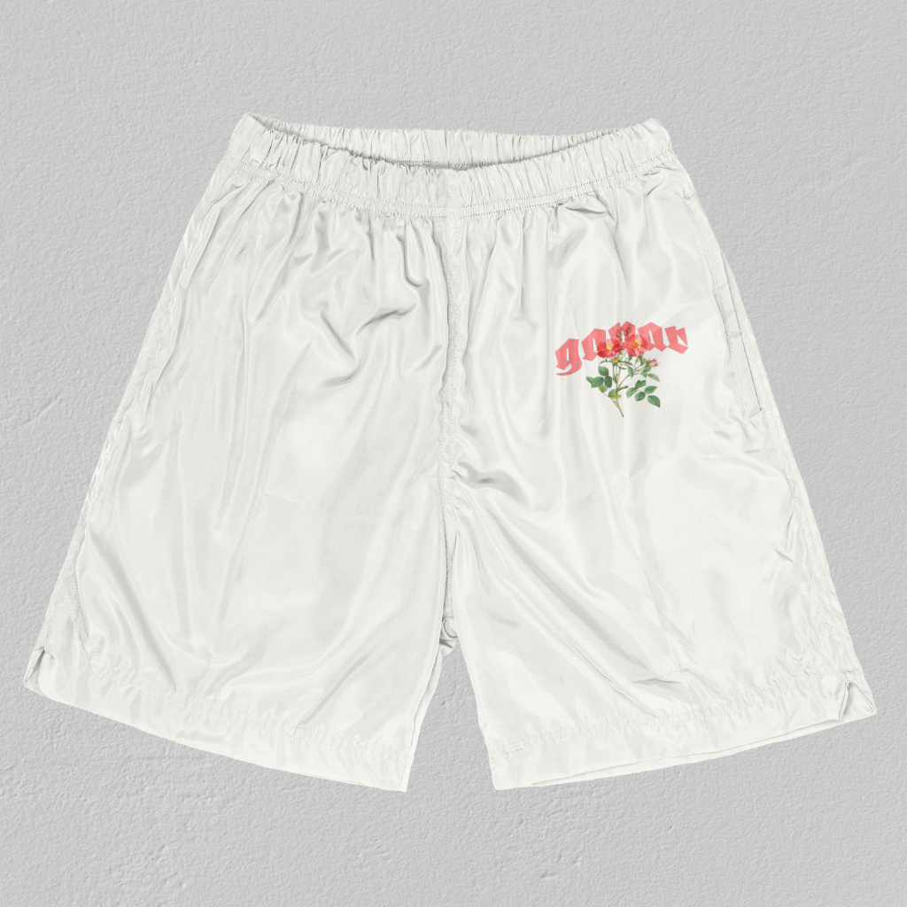 Witte shorts met Ganar logo en roos
